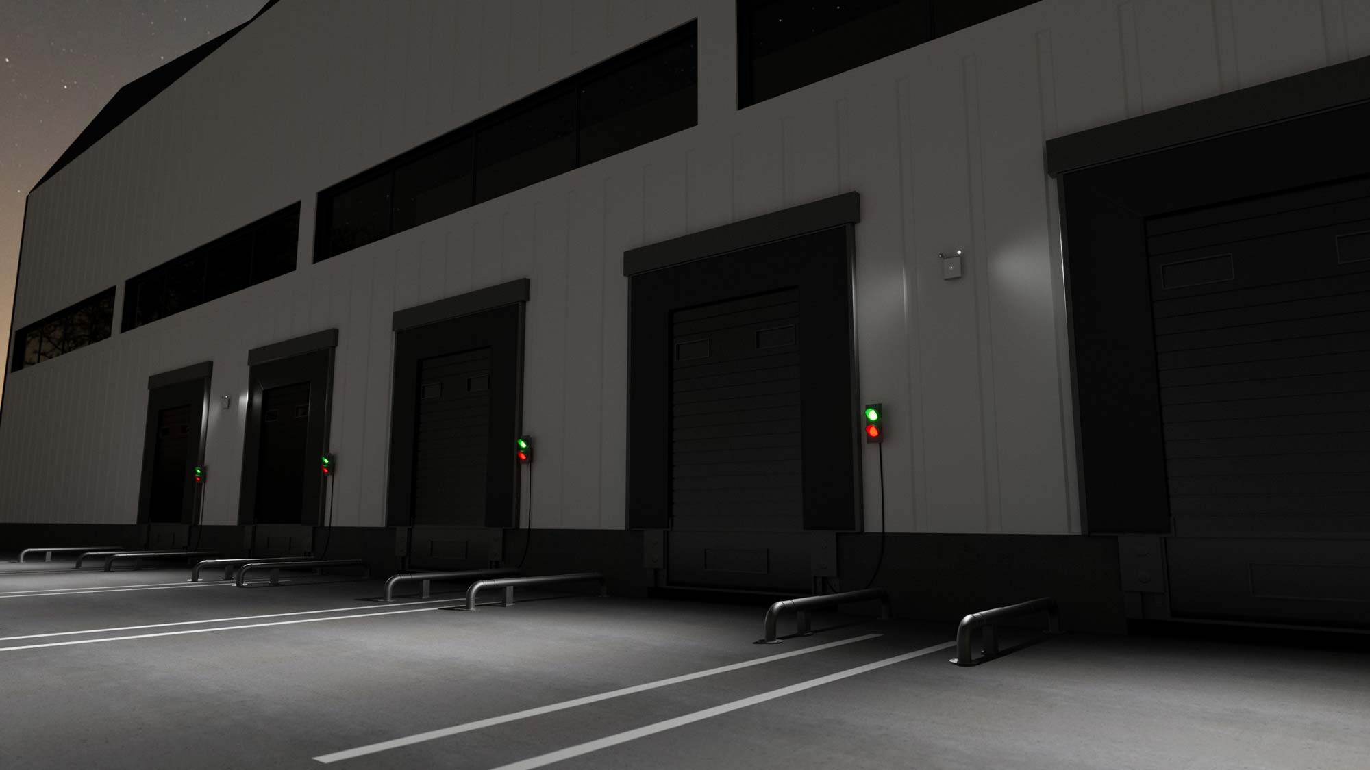 An Evenlite Evolve Emergency Light installed outside of a warehouse at night.