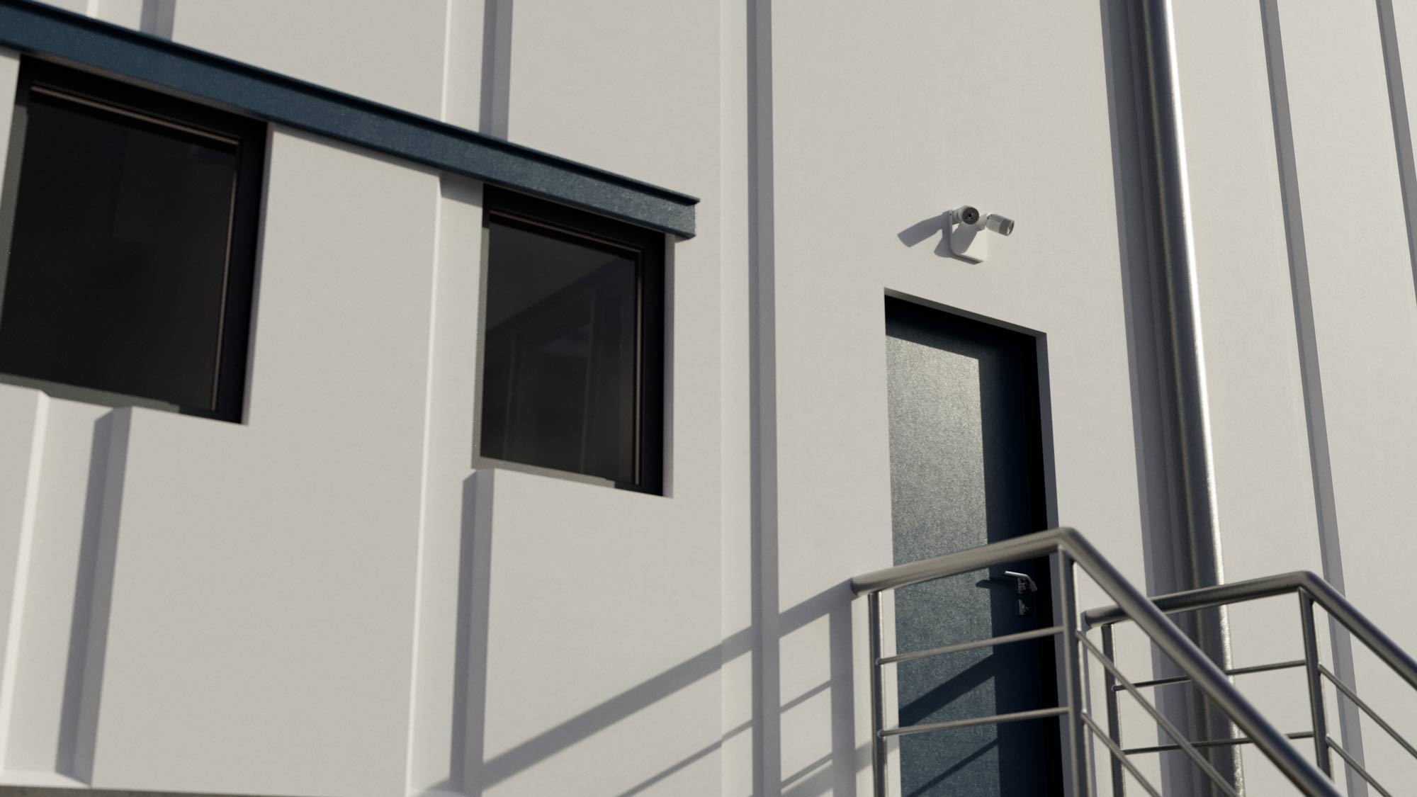 Evenlite Evolve Remote Lamp Heads installed outside of a warehouse during the day.